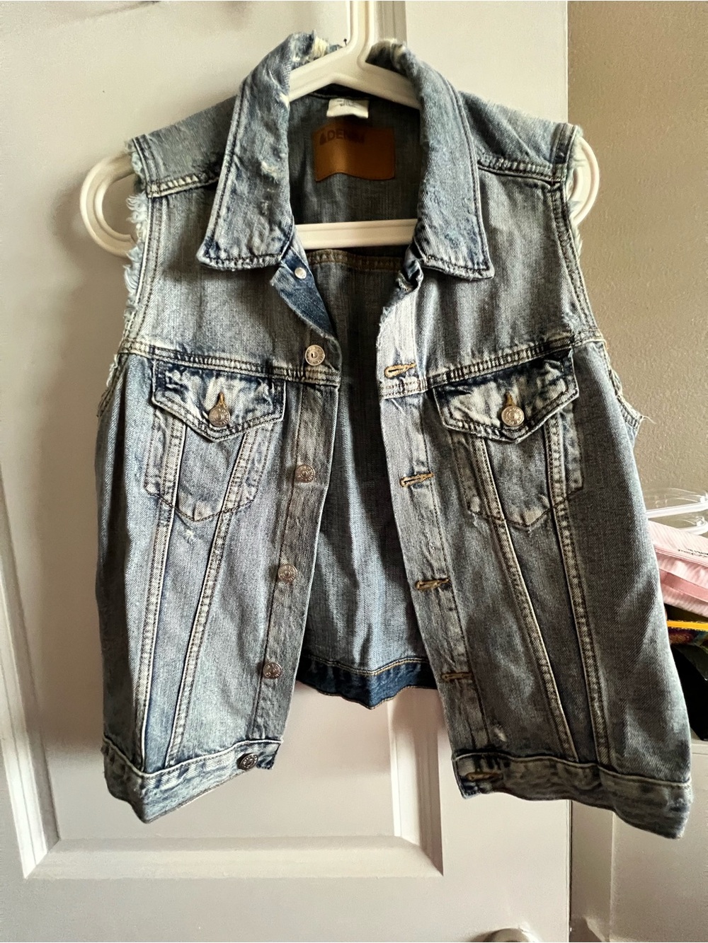 Woman’s H&M Distressed Denim Vest